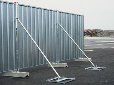 Steel temporary hoardings are installed with the bracing to improve its stability.