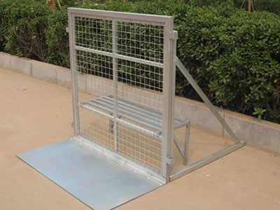 A stage barrier on the roadside and its front panel is welded mesh type.